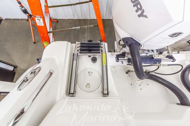 Slide: The Image of 2023 Boston Whaler 250 Outrage boat with Mercury engine and ladder, at Lakeside Marina. - 10