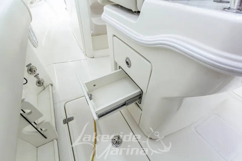 Slide: The Image of Interior storage compartment of 2023 Boston Whaler 250 Outrage boat. - 27