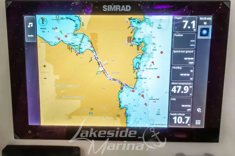 Slide: The Image of Simrad navigation display on 2023 Boston Whaler 250 Outrage, showing depth and water temperature. - 36