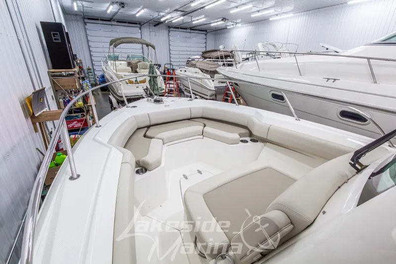 Slide: The Image of 2023 Boston Whaler 250 Outrage boat interior in a marina storage facility. - 50
