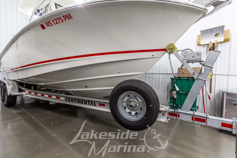 Slide: The Image of 2023 Boston Whaler 250 Outrage on Continental trailer at Lakeside Marina. - 6