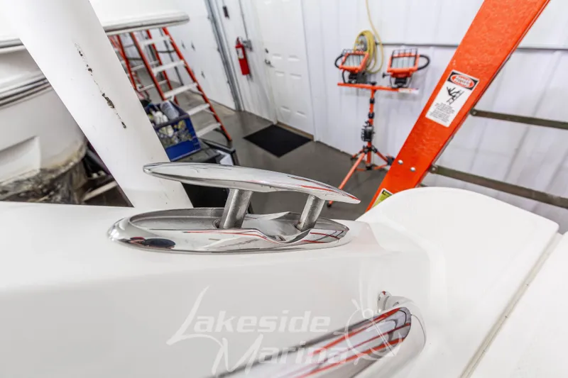 Slide: The Image of 2023 Boston Whaler 250 Outrage boat detail in a workshop setting. - 9