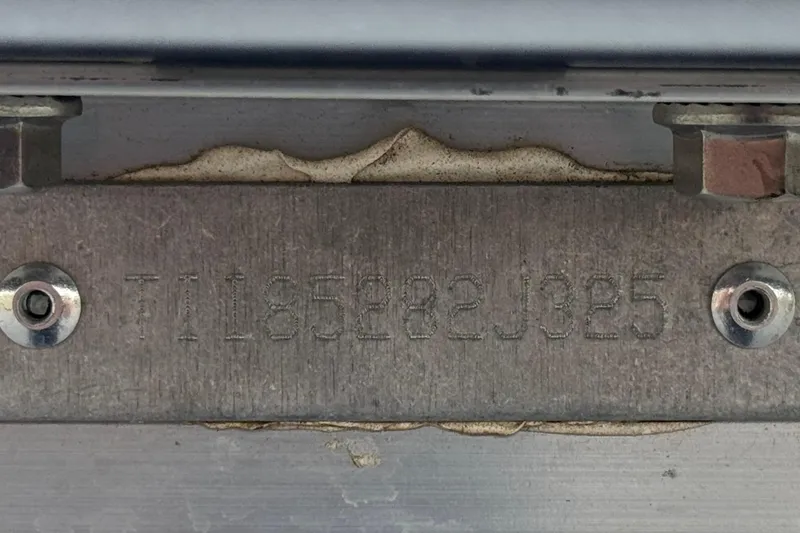 Slide: The Image of Serial number plate on a 2025 Manitou EXPLORE 24 vehicle. - 30