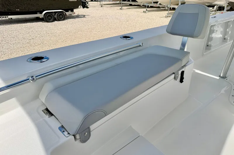 Slide: The Image of 2027 Bay Rider 2260 FS Skiff interior with cushioned seating and sleek design. - 13