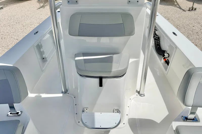 Slide: The Image of Bay Rider 2260 FS Skiff 2027 interior with seating and storage compartments. - 16