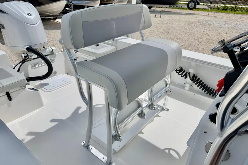 Slide: The Image of 2027 Bay Rider 2260 FS Skiff interior with seating and motor detail. - 18