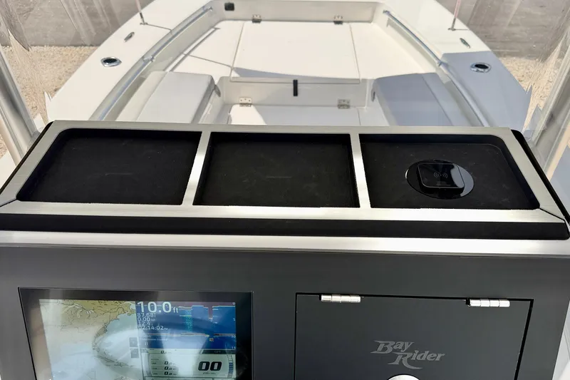 Slide: The Image of Bay Rider 2260 FS Skiff 2027 dashboard with navigation display and sleek design. - 27