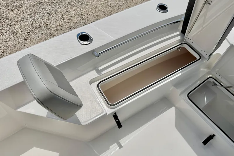 Slide: The Image of 2027 Bay Rider 2260 FS Skiff interior with storage compartment and seating. - 40