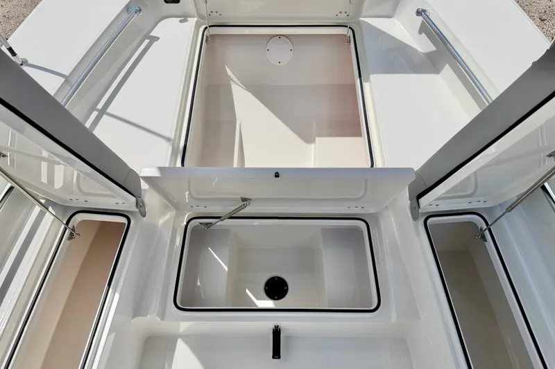 Slide: The Image of Bay Rider 2260 FS Skiff 2027 model, showcasing open storage compartments and sleek design. - 43