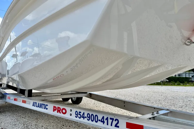 Slide: The Image of Bay Rider 2260 FS Skiff 2027 on trailer, showcasing sleek hull design. - 53