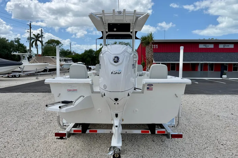 Slide: The Image of 2027 Bay Rider 2260 FS Skiff boat on trailer, outdoor dealership setting. - 6