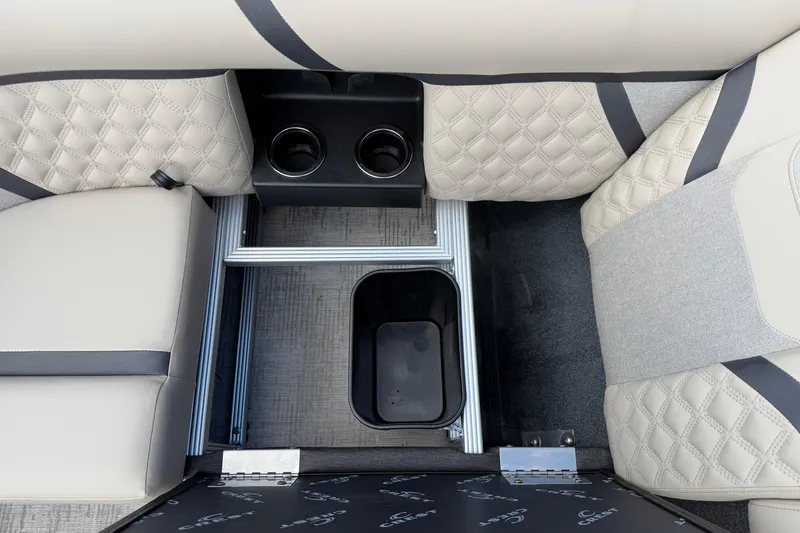 Slide: The Image of Interior seating and cup holders of 2026 Crest Conquest 230 SLSC boat. - 19