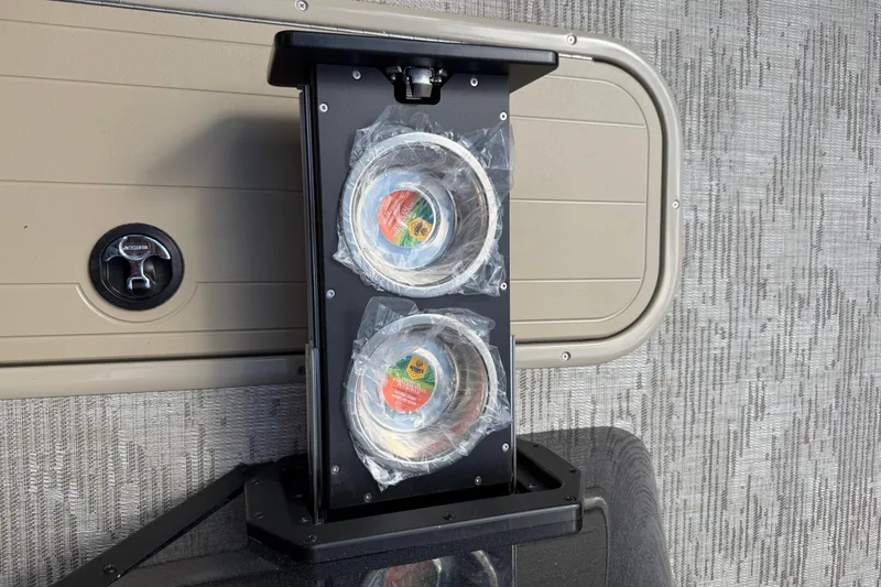 Slide: The Image of Cup holders on a 2026 Crest Conquest 230 SLSC boat, wrapped in plastic. - 22