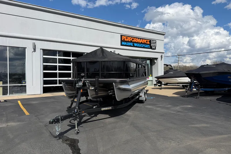 Slide: The Image of 2026 Crest Conquest 230 SLSC pontoon boat at Performance Marine Watersports dealership. - 31