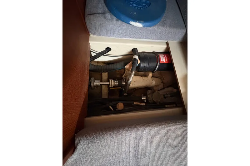 Slide: The Image of Interior view of a 1993 Hunter 28 sailboat showing mechanical components. - 31