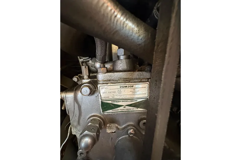 Slide: The Image of Close-up of a Yanmar 2GM20F diesel engine in a 1993 Hunter 28 sailboat. - 37