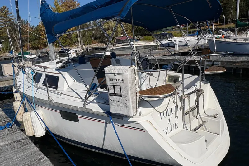 Slide: The Image of Sailboat docked at marina, 1993 Hunter 28 model, named "Touch of Blue." - 8