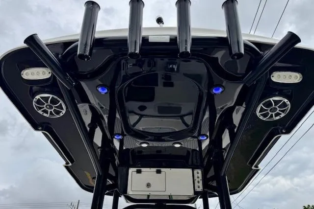 Slide: The Image of 2020 Sea Pro 248 Bay boat with rod holders and speakers on the T-top. - 11