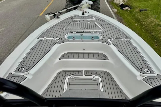 Slide: The Image of 2020 Sea Pro 248 Bay boat deck with gray non-slip surface, viewed from above. - 13
