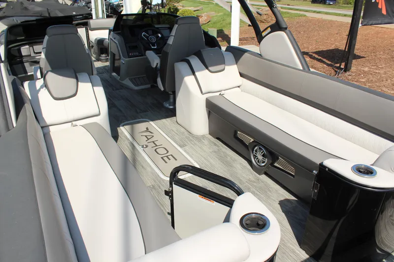 Slide: The Image of 2024 Tahoe Pontoon Cascade Quad Lounge Windshield interior with luxurious seating and modern design. - 10