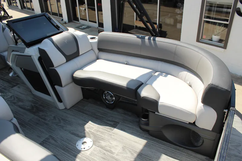 Slide: The Image of 2024 Tahoe Pontoon Cascade Quad Lounge Windshield interior with sleek seating and modern design. - 17