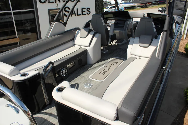Slide: The Image of 2024 Tahoe Pontoon Cascade Quad Lounge Windshield interior with luxurious seating and modern design. - 9