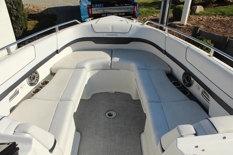 Slide: The Image of 2023 Formula 310 Bowrider I/O boat interior with spacious seating and modern design. - 16