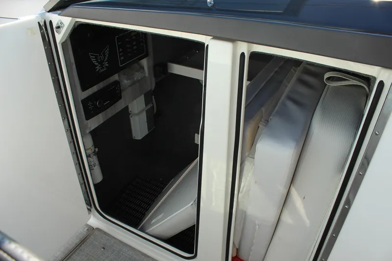 Slide: The Image of 2023 Formula 310 Bowrider I/O cabin interior with seating and control panel. - 17