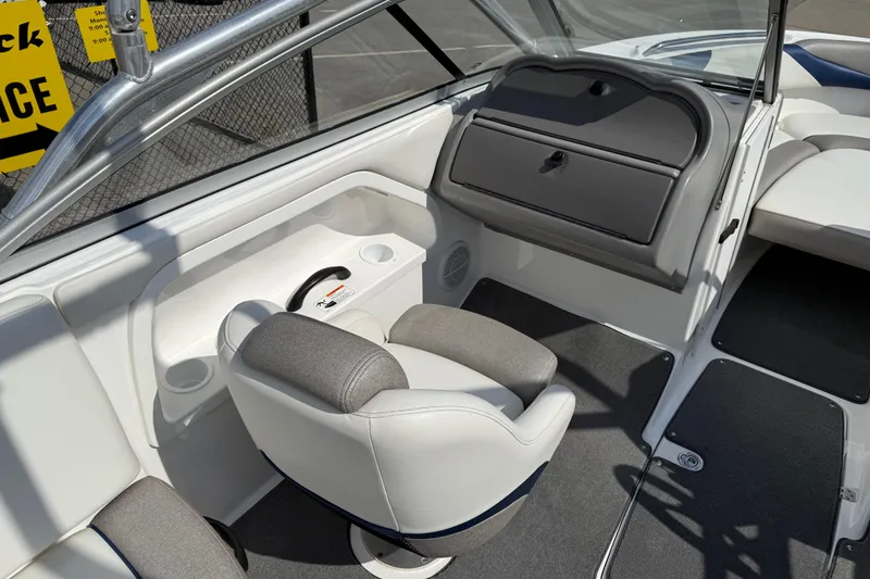 Slide: The Image of 2005 Yamaha Boats SX230 interior with seating and storage compartments. - 20