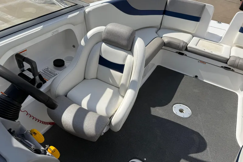 Slide: The Image of 2005 Yamaha Boats SX230 interior with steering wheel and seating area. - 22