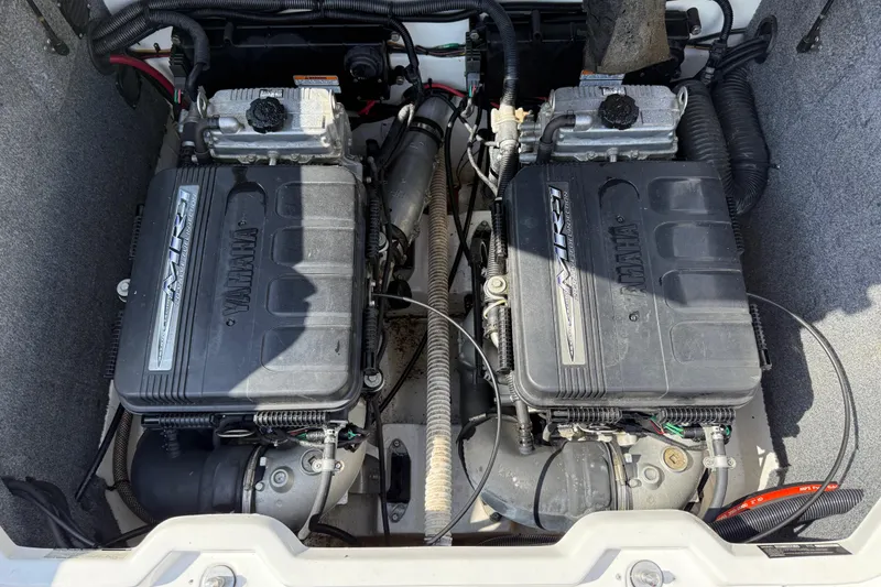 Slide: The Image of Twin engines of a 2005 Yamaha Boats SX230, showcasing detailed mechanical components. - 31