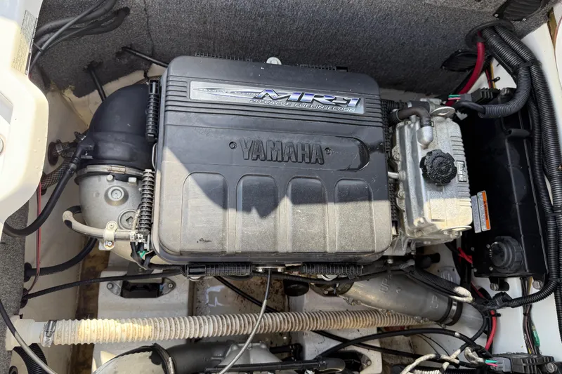 Slide: The Image of 2005 Yamaha Boats SX230 engine compartment showcasing MR1 engine and components. - 32