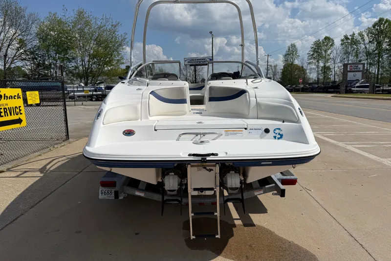 Slide: The Image of 2005 Yamaha Boats SX230 on trailer, rear view, parked outdoors. - 5
