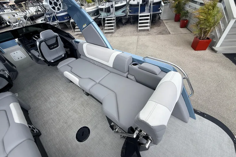 Slide: The Image of Luxurious 2026 Avalon 2 boat interior with plush gray seating and modern design. - 19