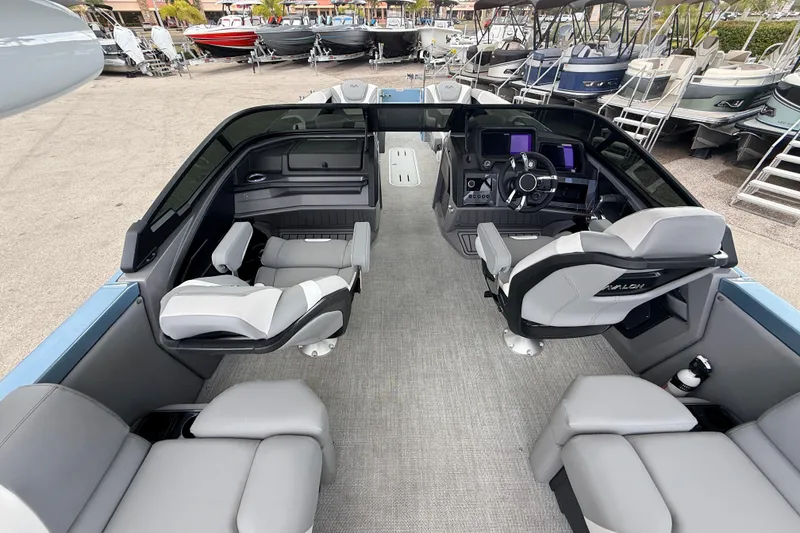 Slide: The Image of 2026 Avalon 2 boat interior with modern seating and advanced dashboard controls. - 21