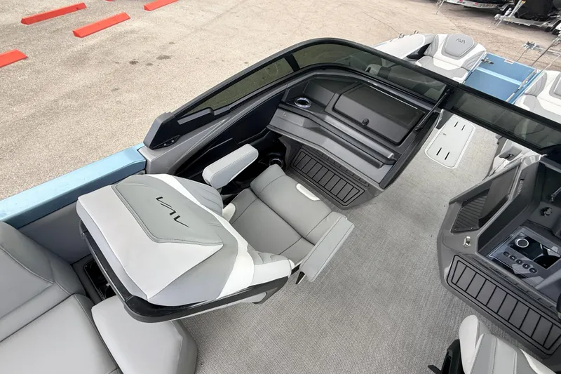 Slide: The Image of 2026 Avalon 2 boat interior with modern seating and sleek dashboard design. - 23