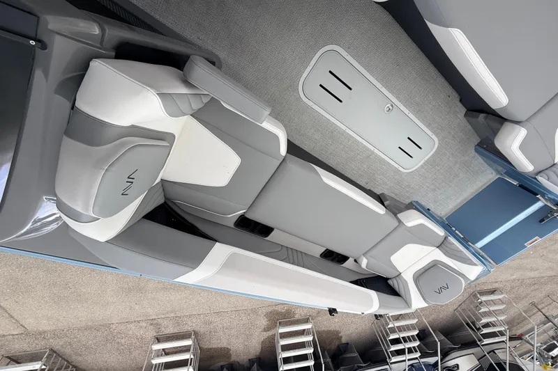 Slide: The Image of 2026 Avalon 2 boat interior with sleek gray and white seating design. - 26