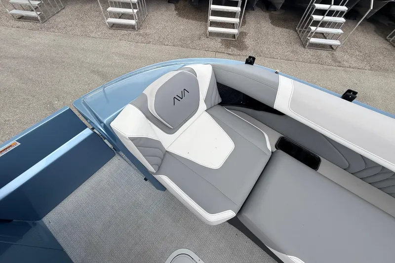 Slide: The Image of 2026 Avalon 2 boat interior with gray and white seating, showcasing modern design. - 28