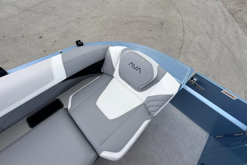 Slide: The Image of 2026 Avalon 2 boat interior with gray and white seating on a textured floor. - 29