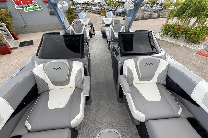 Slide: The Image of Luxurious 2026 Avalon Model 2 boat interior with sleek gray and white seating. - 31