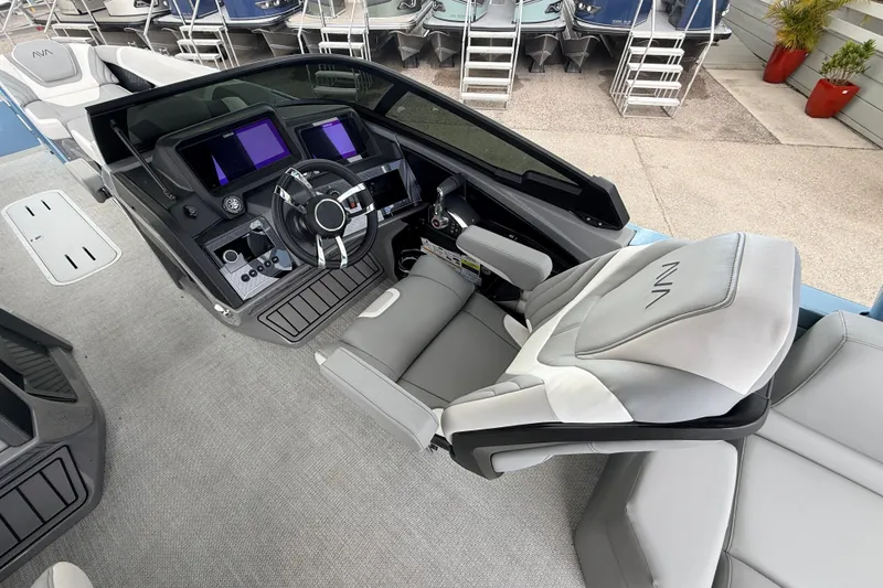 Slide: The Image of Luxurious 2026 Avalon 2 boat interior with modern dashboard and comfortable seating. - 35