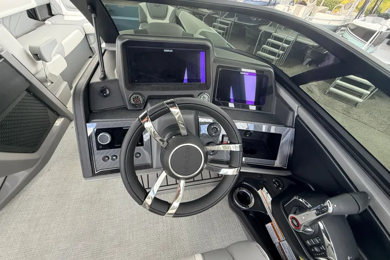 Slide: The Image of Steering console of 2026 Avalon 2 boat with modern controls and displays. - 36