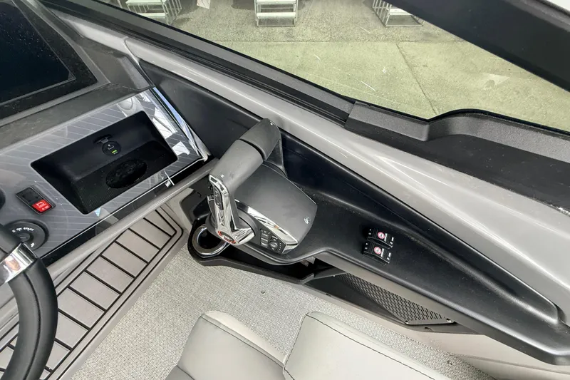 Slide: The Image of Interior view of 2026 Avalon 2 boat cockpit with modern controls and steering. - 37