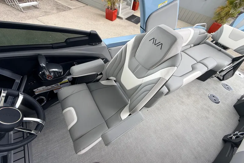 Slide: The Image of Luxurious 2026 Avalon 2 boat interior with sleek gray seating and modern controls. - 40
