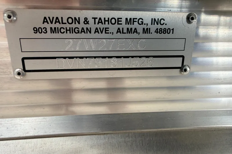 Slide: The Image of Metal identification plate for Avalon & Tahoe MFG, Inc., featuring serial numbers and address. - 44