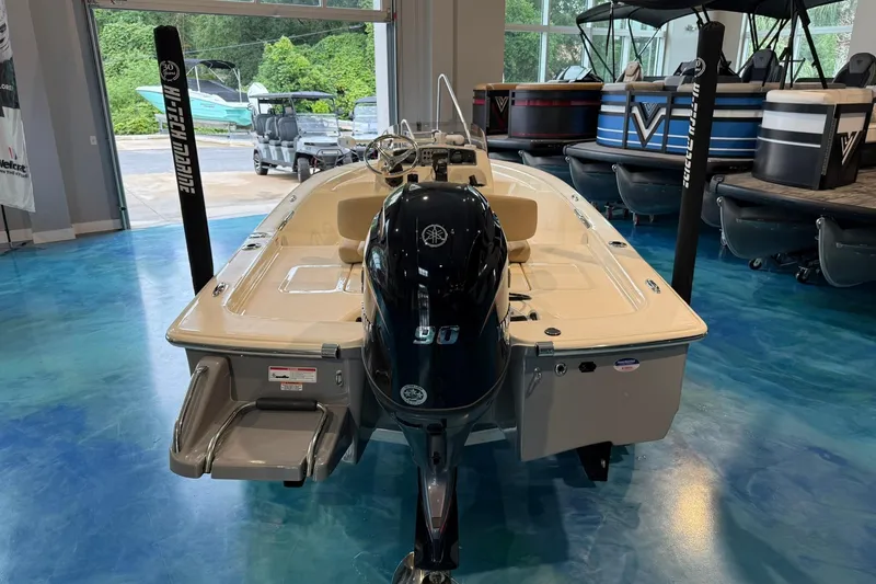 Slide: The Image of 2026 Scout 177 XSS boat with Yamaha outboard motor in showroom. - 3