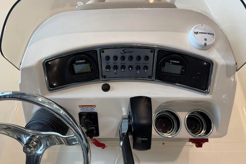 Slide: The Image of 2026 Scout 177 XSS boat dashboard with Yamaha controls and Minn Kota accessory. - 9