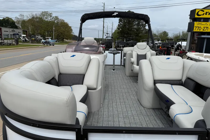Slide: The Image of 2022 Starcraft SLS 3 pontoon boat with luxurious seating and modern design. - 10