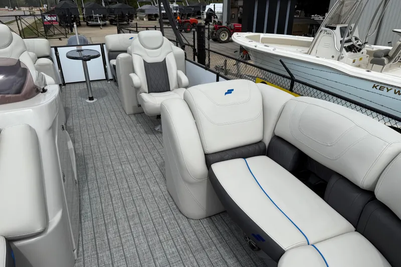 Slide: The Image of Luxurious interior of 2022 Starcraft SLS 3 pontoon boat with plush seating and modern design. - 11