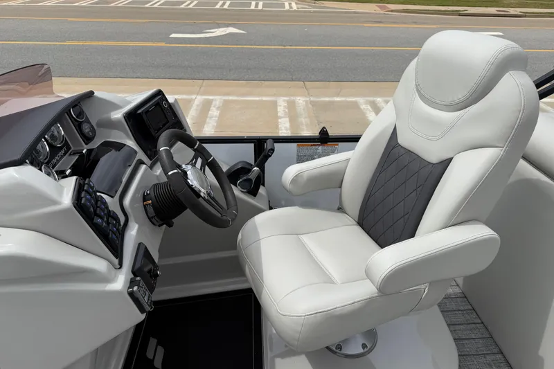 Slide: The Image of Luxurious 2022 Starcraft SLS 3 boat cockpit with plush captain's chair and modern dashboard. - 17